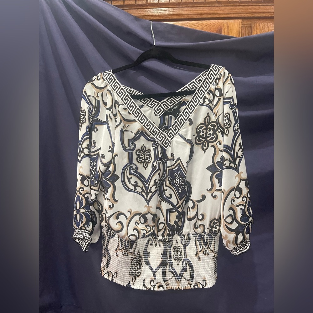 White House Black Market Blouse Silk and very sophisticated.